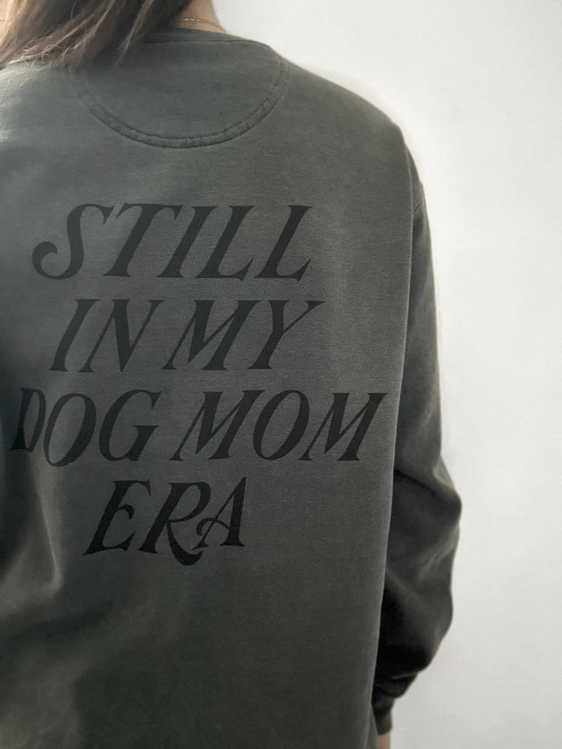 Introducing our "Still in My Dog Mom Era" sweatshirt – because the dog mom magic never fades! 🐾✨ Celebrate your timeless dog mom era and let the world know