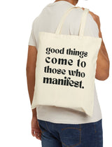 Introducing our "Good Things Come to Those Who Manifest" tote bag – your daily reminder that dreams do come true, and you're the magician of your destiny. ✨ Carry this tote, manifest away, and let the universe deliver the goodness! 💫