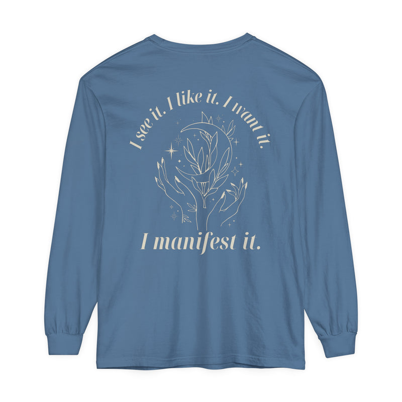 Say hello to our "I Manifest It" long sleeve tee – where cosmic dreams meet cozy comfort! 🌙✨ Let the world know your mantra: "I see it. I like it. I want it. I manifest it." Embrace the magic, wear your aspirations, and manifest your dreams in style! 🌌💫