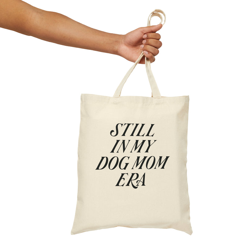 Introducing our "Still in My Dog Mom Era" tote bag – because who needs kids when your life is pawsitively perfect! 🐾For all the fabulous ladies in their 30s embracing their dog mom status, this tote is your style statement. Carry it proudly, declare your love for fur babies, and let the world know you're happily living your dream life. It's not just a bag; it's your chic badge of honor in the Dog Mom Era! 🐕 