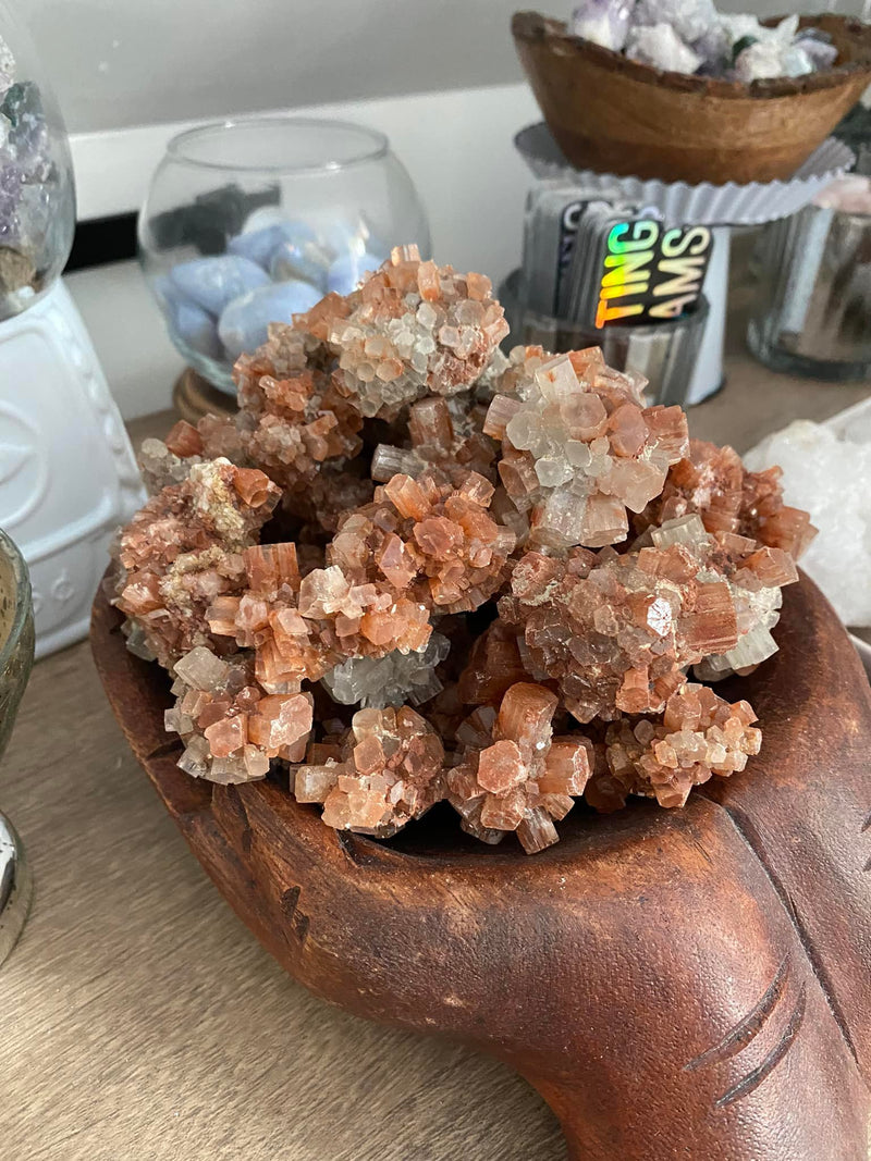 Discover the grounding and harmonizing power of raw Aragonite stones. These captivating gemstones, with their natural formations and earthy hues, offer a sense of calm and stability in your life. Embrace their metaphysical properties and experience a deep connection with the Earth's energies, fostering balance and tranquility. 