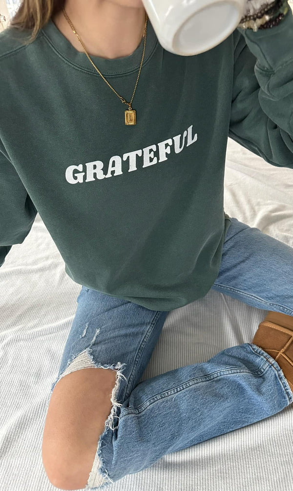 Wrap yourself in our comfy 'Grateful Life' sweatshirt and let the world know that every moment is brighter when you're counting your blessings.🌟 Wear it, feel it, and spread the good vibes like confetti – because in this sweatshirt, gratitude becomes your coziest companion!