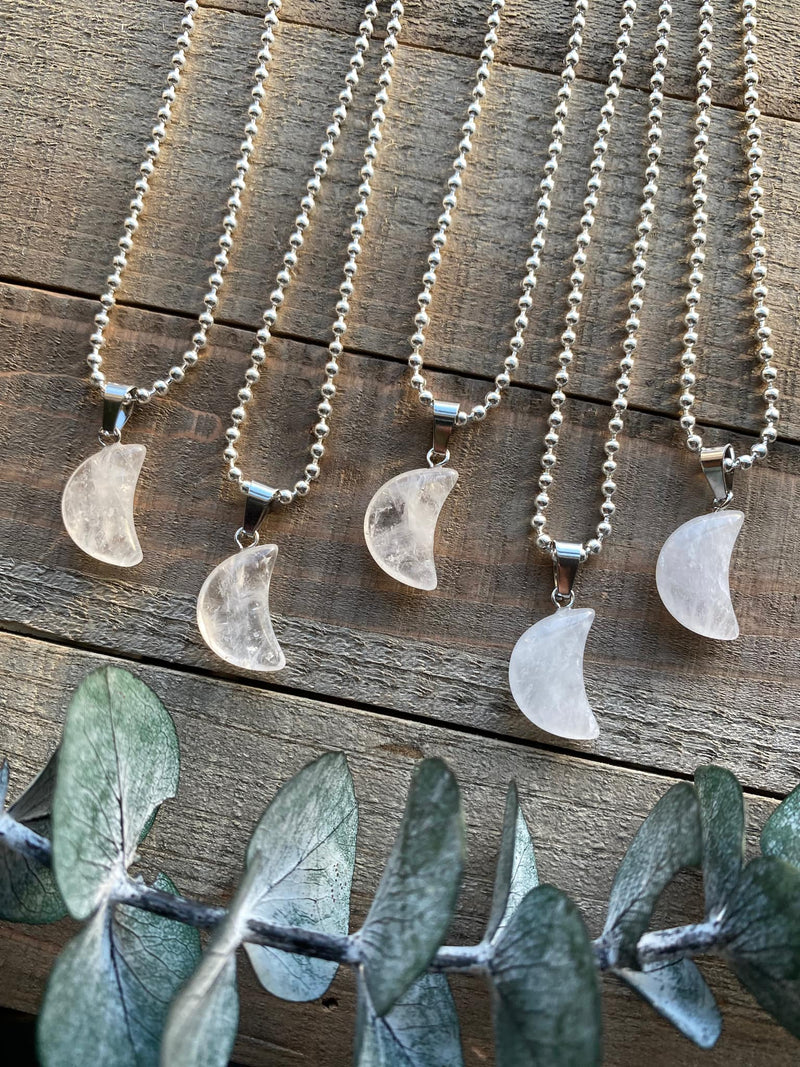 Embrace the celestial beauty and metaphysical properties of our Clear Quartz Crystal Moon Necklace. This enchanting necklace harnesses the amplifying and purifying energy of clear quartz. Radiating clarity, positivity, and spiritual connection, clear quartz promotes mental clarity, balances energies, and amplifies intentions. 