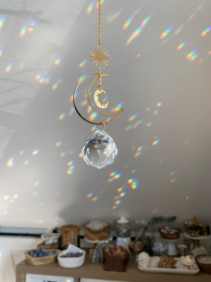 The Celestial Sun Light Catcher - a mesmerizing fusion of celestial beauty and radiant illumination. Designed to bring the enchantment of the cosmos into your living space, this stunning light catcher is a true celestial marvel.