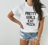 Express your love for both fashion and food with our 'Pretty Girls Eat Pizza' t-shirt. This quirky and playful design celebrates the joy of indulging in delicious slices while empowering women to embrace their unique tastes and passions. Make a bold statement that beauty and appetite can go hand in hand, all while looking effortlessly stylish.