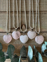 Elevate your style and embrace the loving energy of our Rose Quartz Crystal Heart Necklace. This necklace radiates compassion, healing, and unconditional love. Rose Quartz, known as the 'Stone of Love,' opens the heart chakra, fostering self-love, forgiveness, and emotional healing.