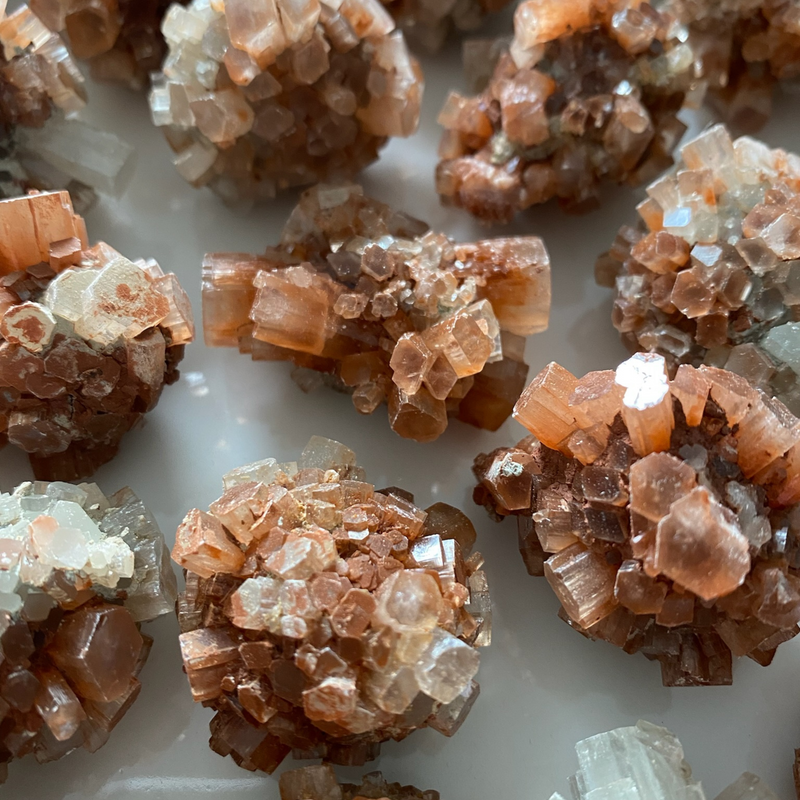 Discover the grounding and harmonizing power of raw Aragonite stones. These captivating gemstones, with their natural formations and earthy hues, offer a sense of calm and stability in your life. Embrace their metaphysical properties and experience a deep connection with the Earth's energies, fostering balance and tranquility. 