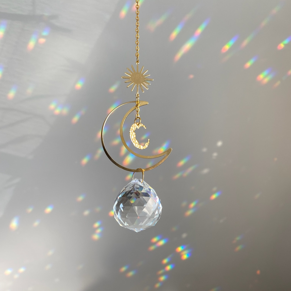 The Celestial Sun Light Catcher - a mesmerizing fusion of celestial beauty and radiant illumination. Designed to bring the enchantment of the cosmos into your living space, this stunning light catcher is a true celestial marvel.